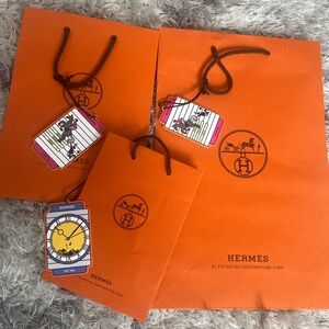 orange bag with charms 3different sizes